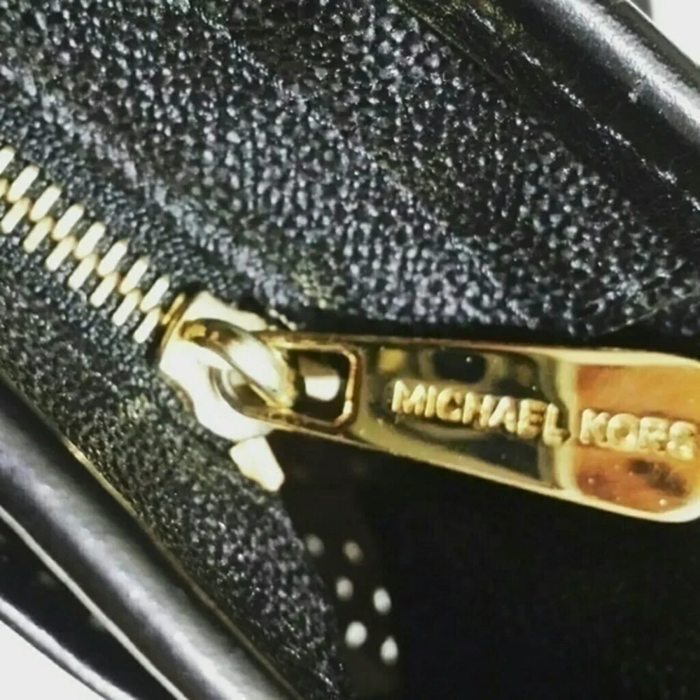 Michael Kors Perforated Leather Signature Bag